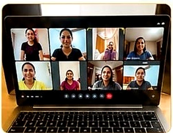 Live online group fitness and yoga class conducted over video call